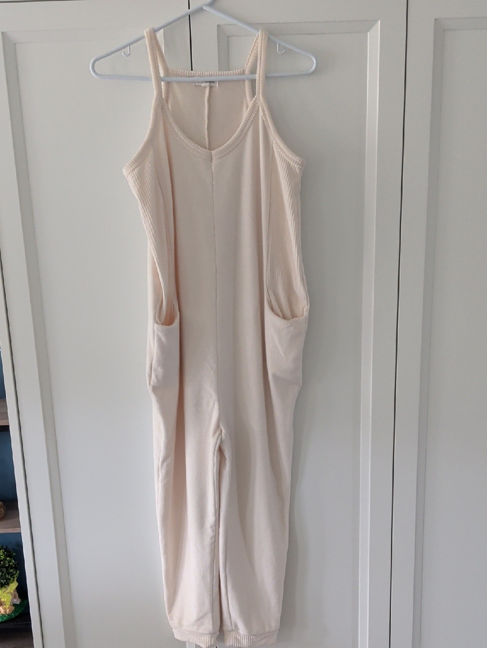 Thrive Sleeveless Ribbed Cream Jumpsuit with Side Pockets